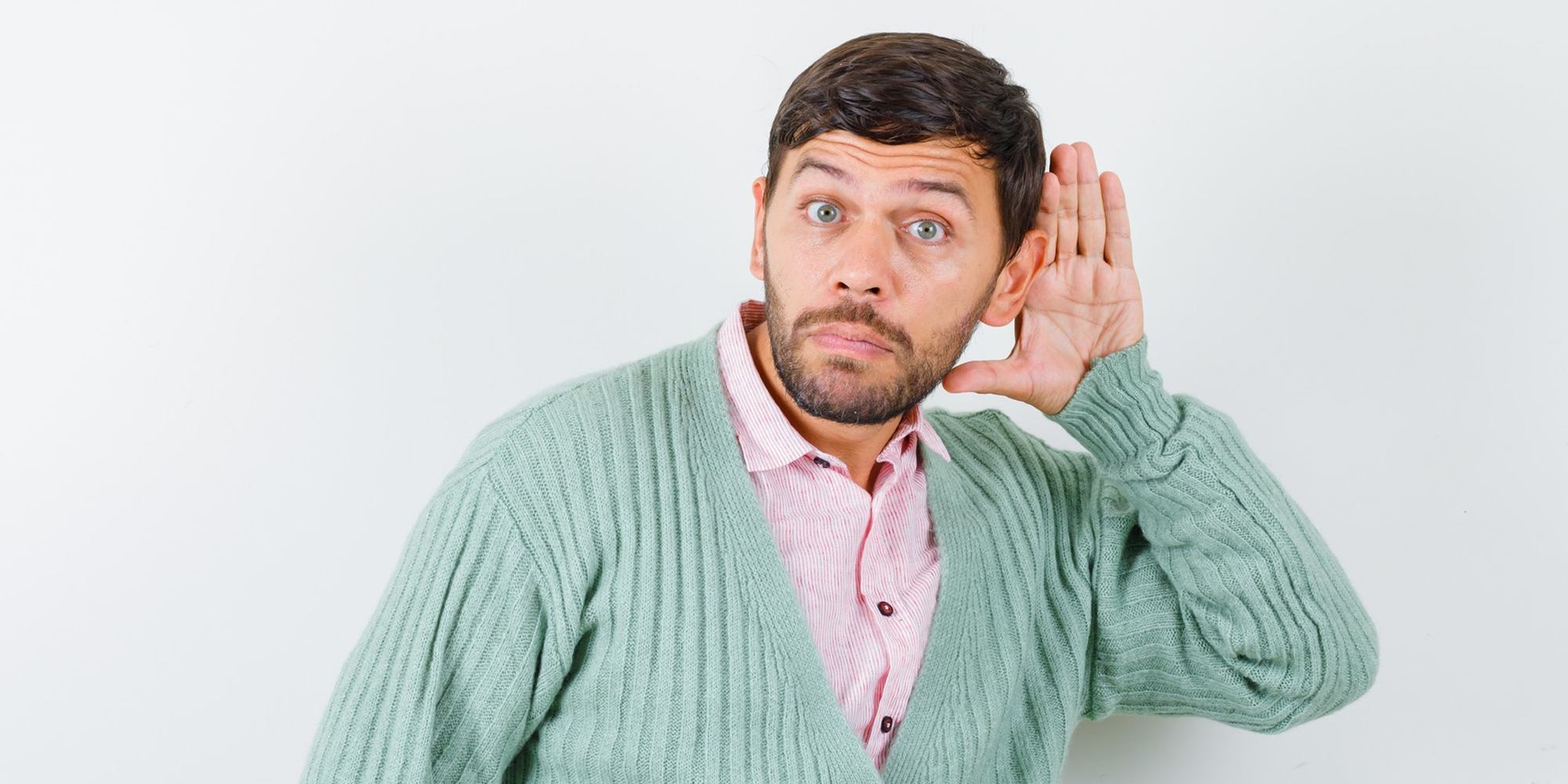 Person making a listening gesture